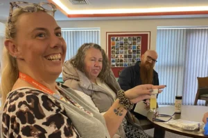 Colleagues holding a UTI stick test