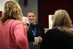 Attendees chatting at our recent dementia information market place event