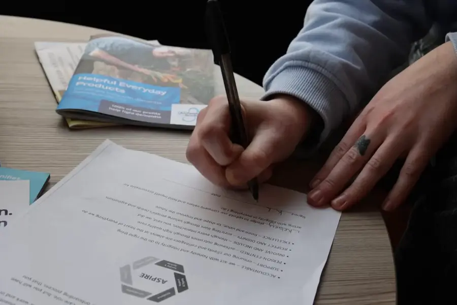 close up of the unique senior acre values pledge being signed