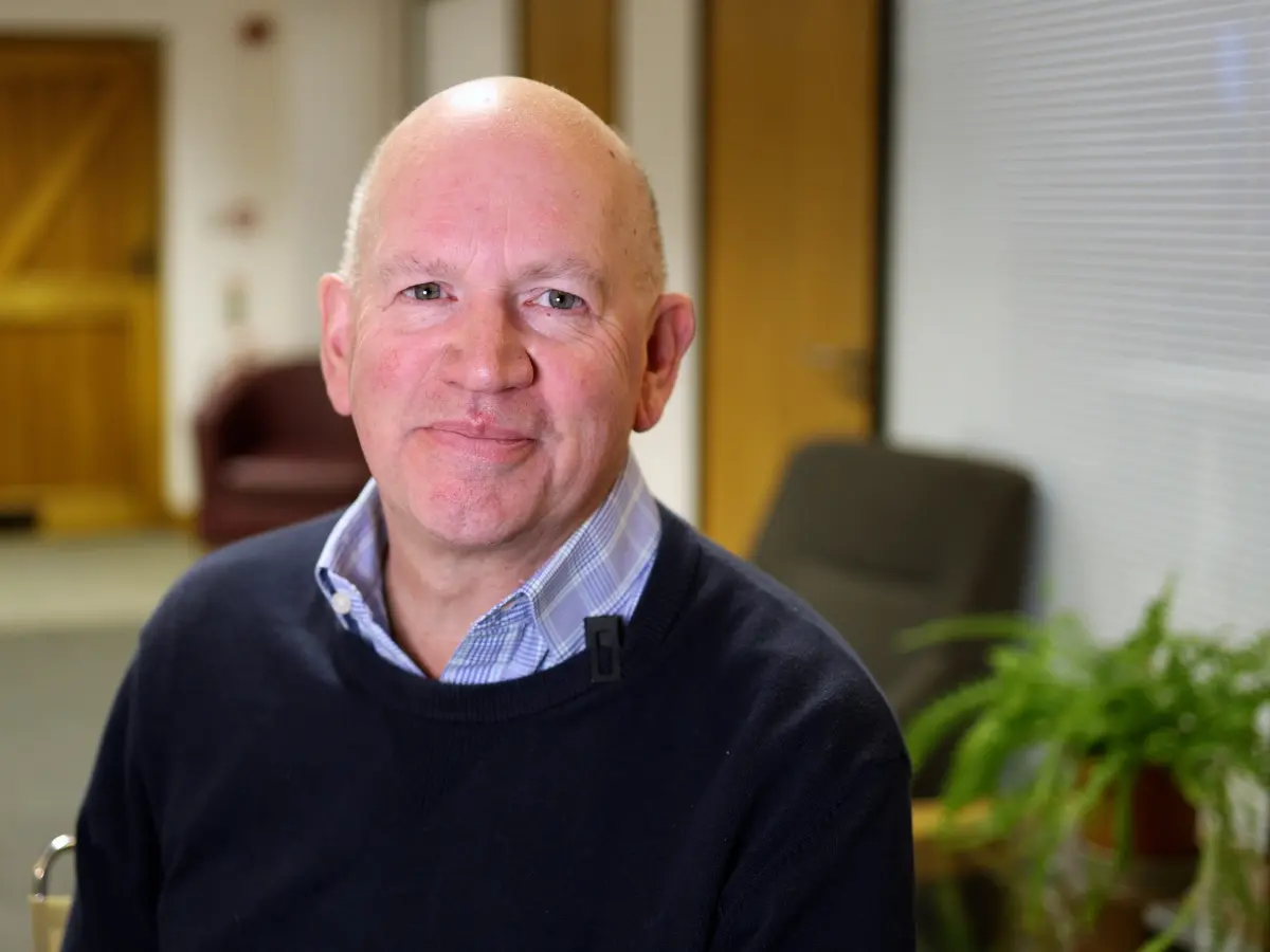 Philip Maundrill, co-owner and director of Unique Senior Care smiling at the camera