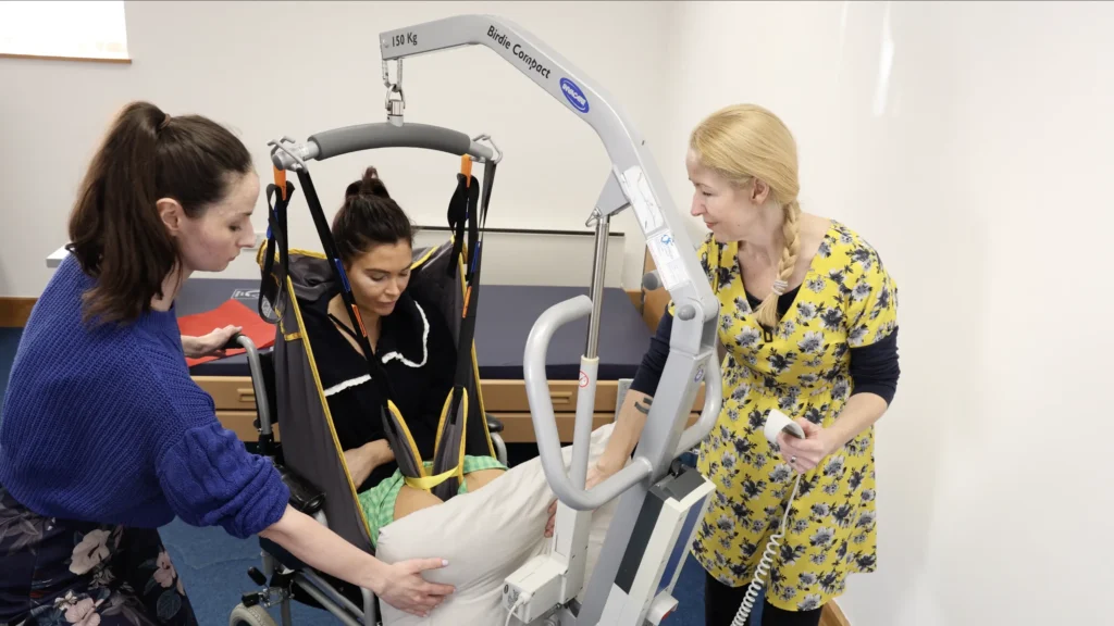 Our trainer Jo and her assistant, Hannah demonstrating safe practices using a hoist
