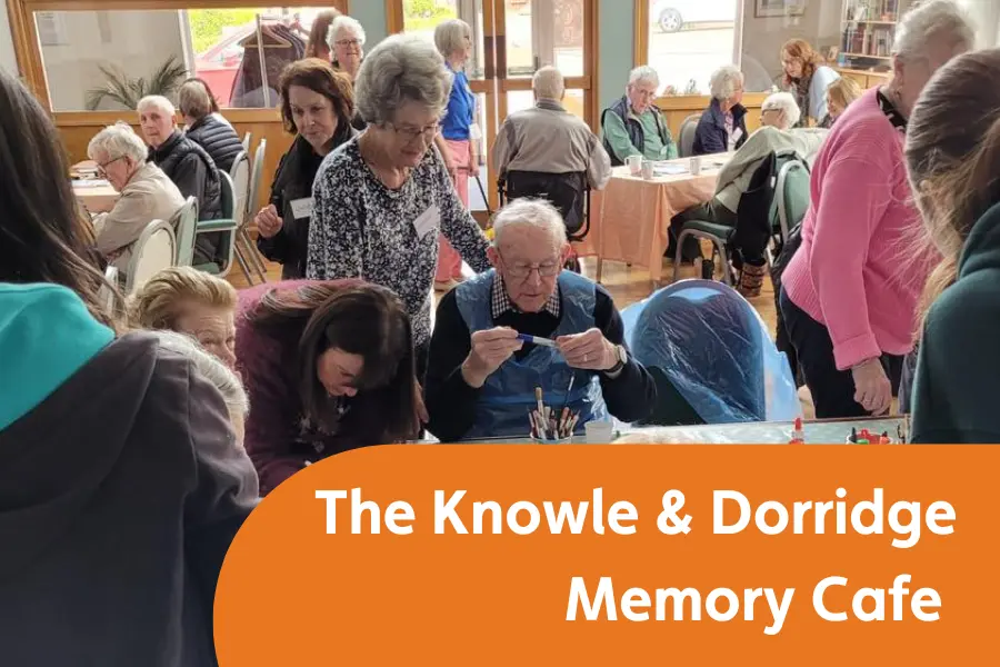 An image of people having fun at the Knowle and Dorridge memory Cafe, overlayed with the text 'The Knowle and Dorridge memory cafe'