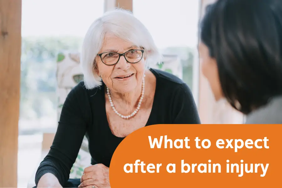 Thumbnail image of 'what to expect after a brain injury' blog, featuring a woman looking thoughtfully at another lady in conversation