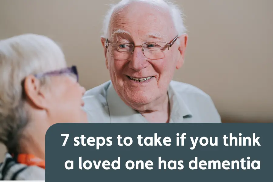 An older man smiling warmly at a woman during a conversation. Text overlay reads: '7 steps to take if you think a loved one has dementia'.