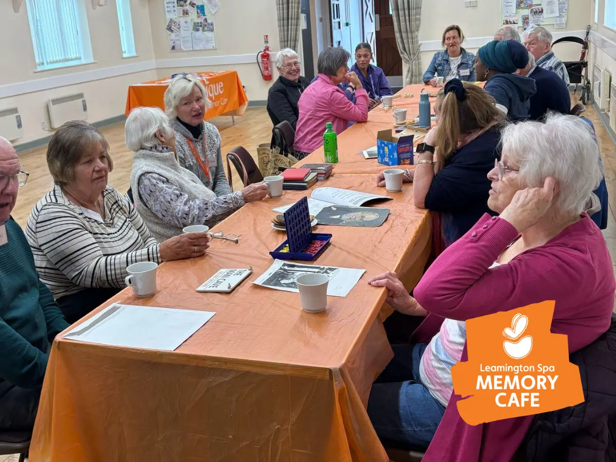 Image of attendees enjoying activities at the Leamington Spa and Kenilworth memory cafe