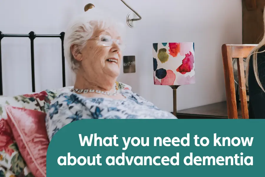 Image shows an elderly woman looking at somebody out of shot, with the text overlay reading 'what you need to know about advanced dementia'